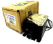 El transformador de encendido ferromagnético Allanson 1092 type f, negro, con etiqueta superior y soportes de montaje, está junto a una caja de cartón marrón gastada con etiqueta y código de barras.