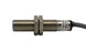 The I12000001 SENSOR DE PROX12MM DIAMSENSA 2MM 20-250 SI12A2 NC is a cylindrical M12 inductive sensor with threaded body, two hex nuts, attached cable, visible label, and IP67 protection for reliable operation.